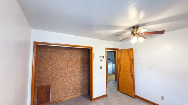 a view of a room with closet area