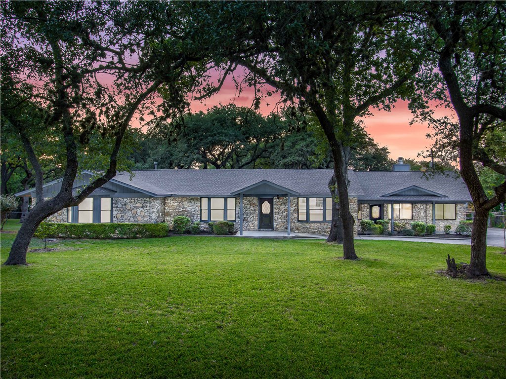 a house view with a garden space