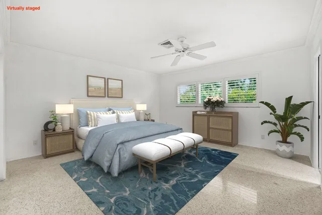 a bed room with a bed and a chandelier