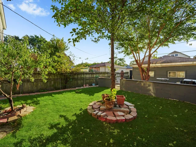 a view of a garden with a fountain