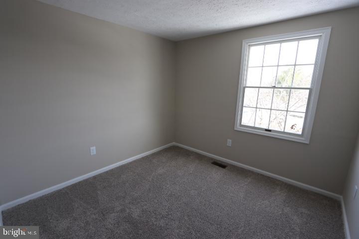 10149 Shelldrake Circle Damascus, MD 20872 - Photo 18 of 28 an empty room with a window