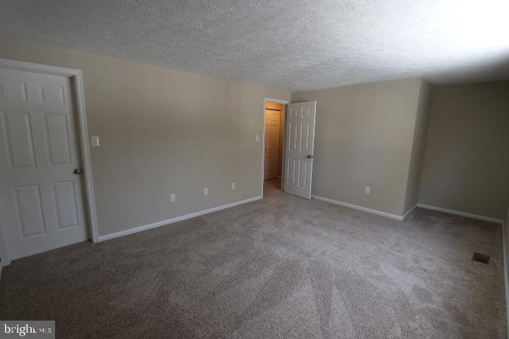 10149 Shelldrake Circle Damascus, MD 20872 - Photo 24 of 28 a view of an empty room and closet area