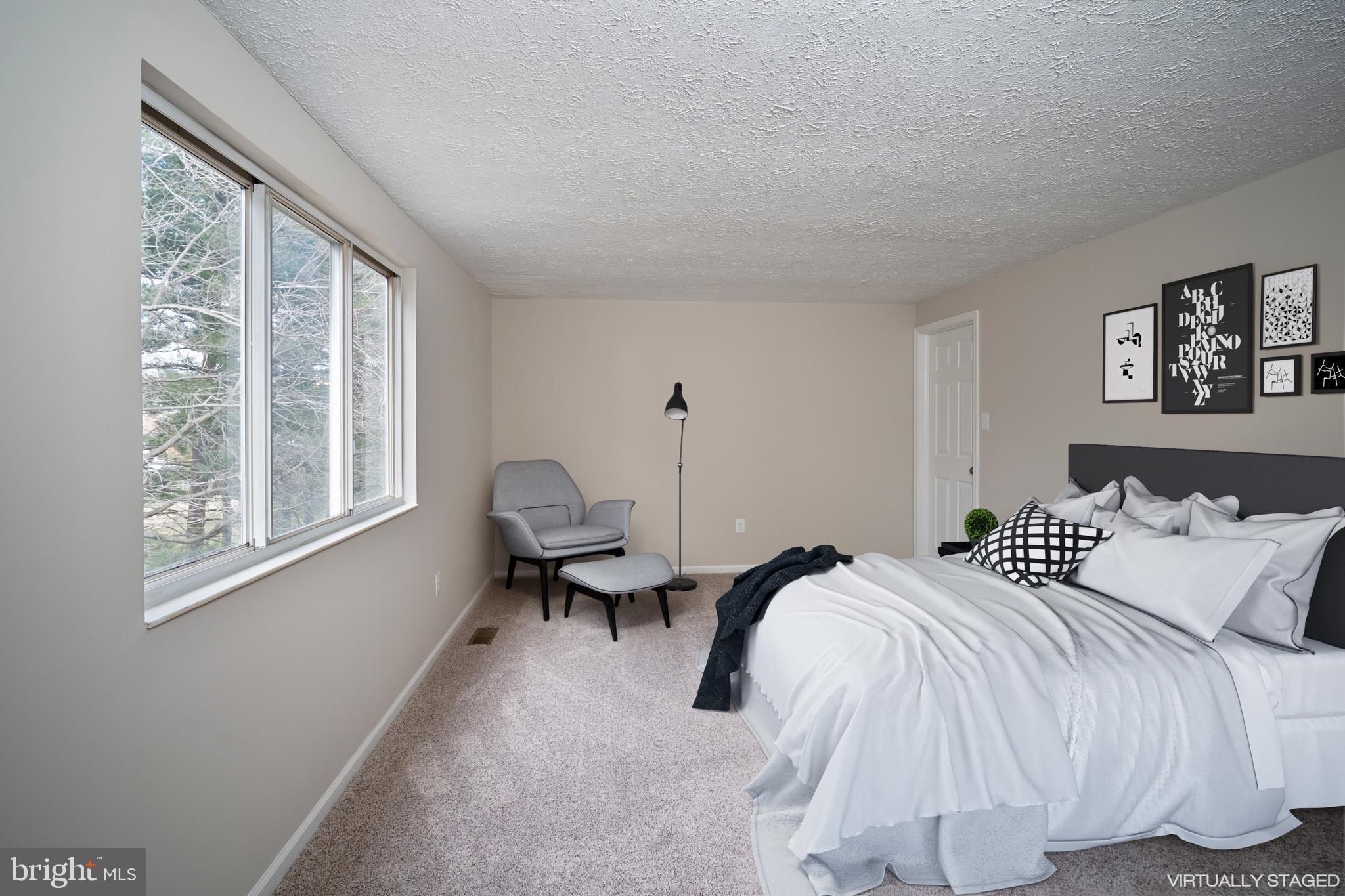 10149 Shelldrake Circle Damascus, MD 20872 - Photo 25 of 28 a bedroom with two beds and a large window