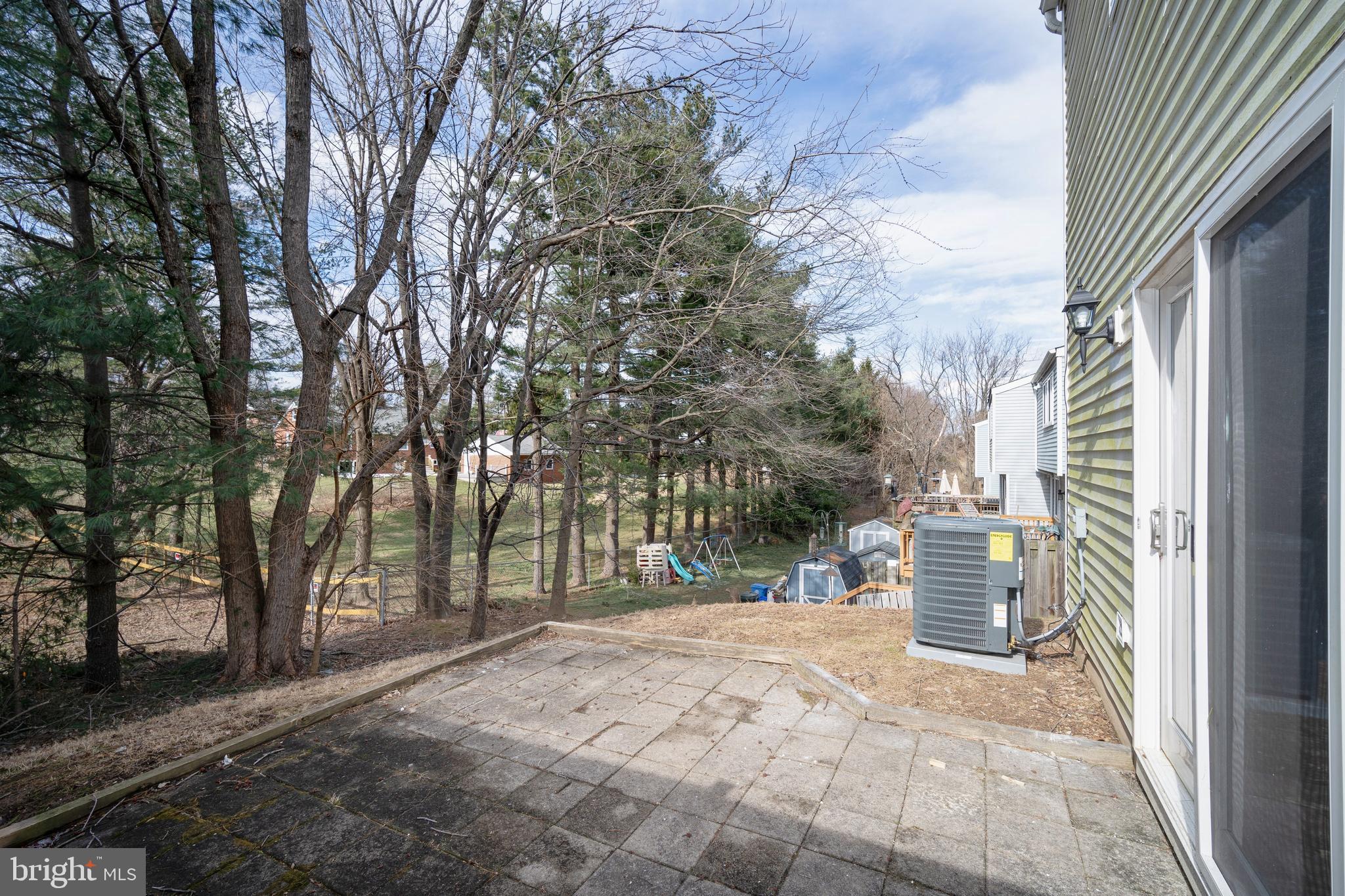 10149 Shelldrake Circle Damascus, MD 20872 - Photo 28 of 28 a view of a outdoor space with a patio and backyard