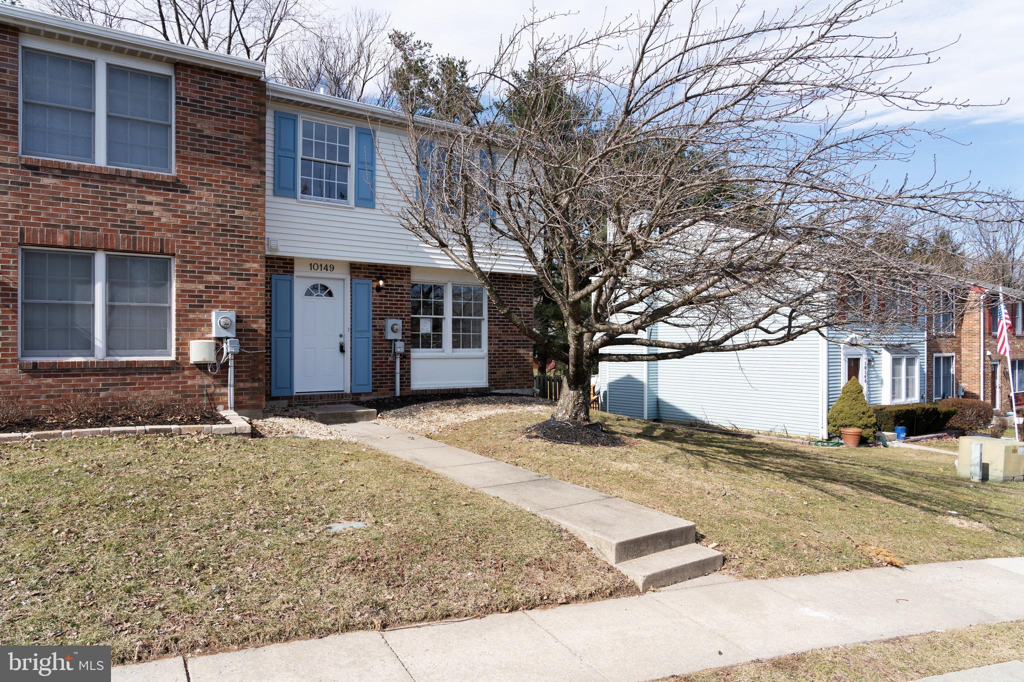 10149 Shelldrake Circle Damascus, MD 20872 - Photo 5 of 28 a front view of a house with a yard