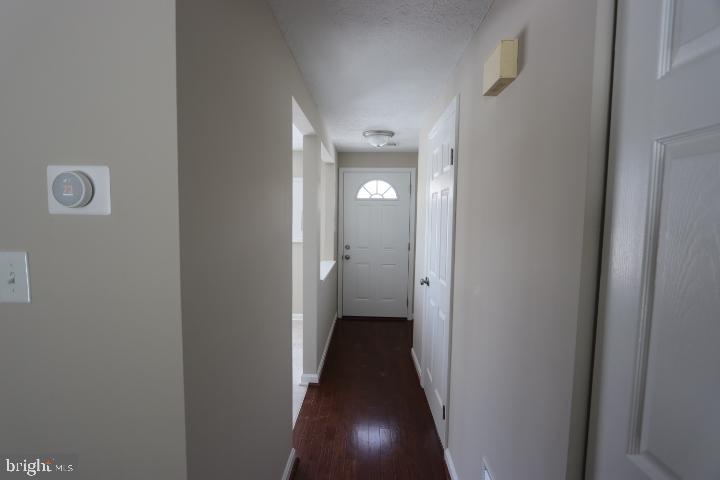 10149 Shelldrake Circle Damascus, MD 20872 - Photo 7 of 28 a view of a hallway with a white walls
