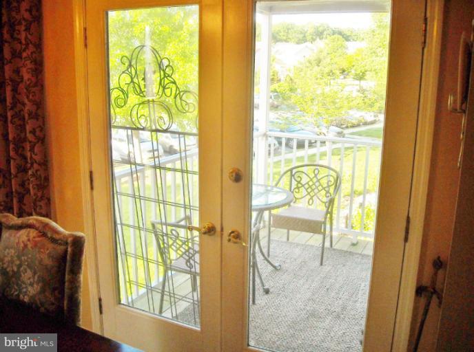 711 Deering Road, Unit 5H Pasadena, MD 21122 - Photo 14 of 30 Dining Room w/ French doors to balcony