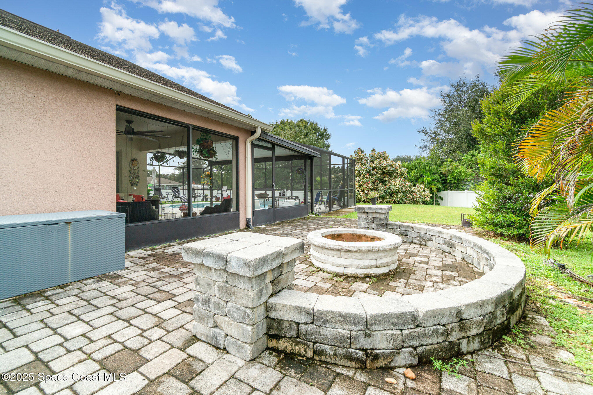 1350 Creekview Court St. Cloud, FL 34772 - Photo 24 of 27 a view of a house with backyard porch and sitting area