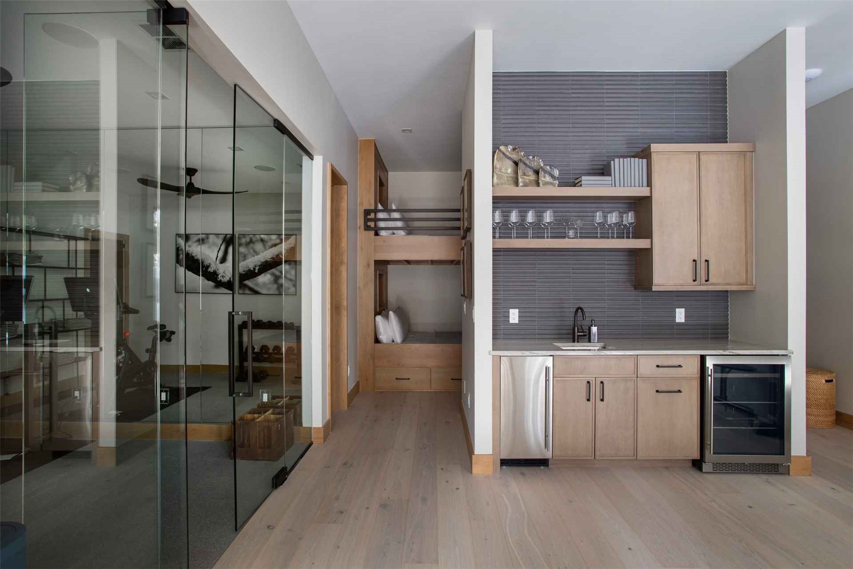 3764 Ski Hill Road Breckenridge, CO 80424 - Photo 20 of 30 Indoor wet bar featuring open shelves, light wood finish cabinetry, beverage cooler, and light wood-style floors