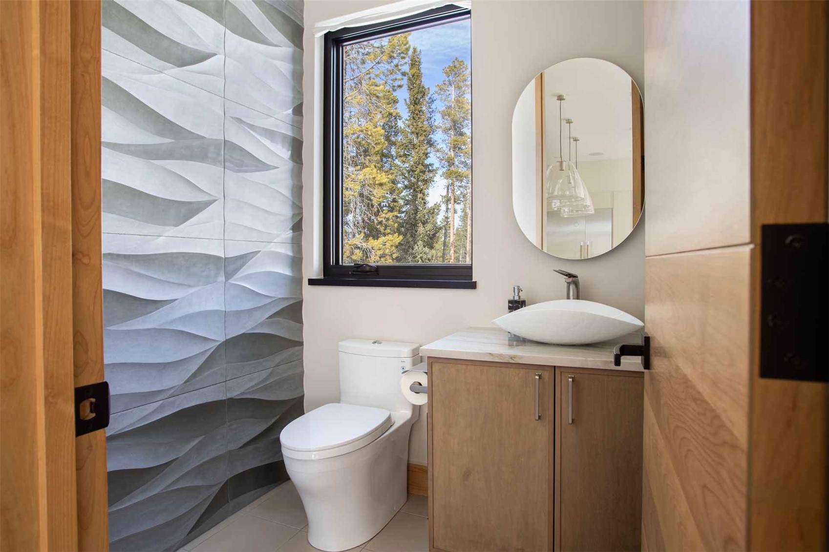 3764 Ski Hill Road Breckenridge, CO 80424 - Photo 26 of 30 Half bathroom with vanity and light tile patterned flooring