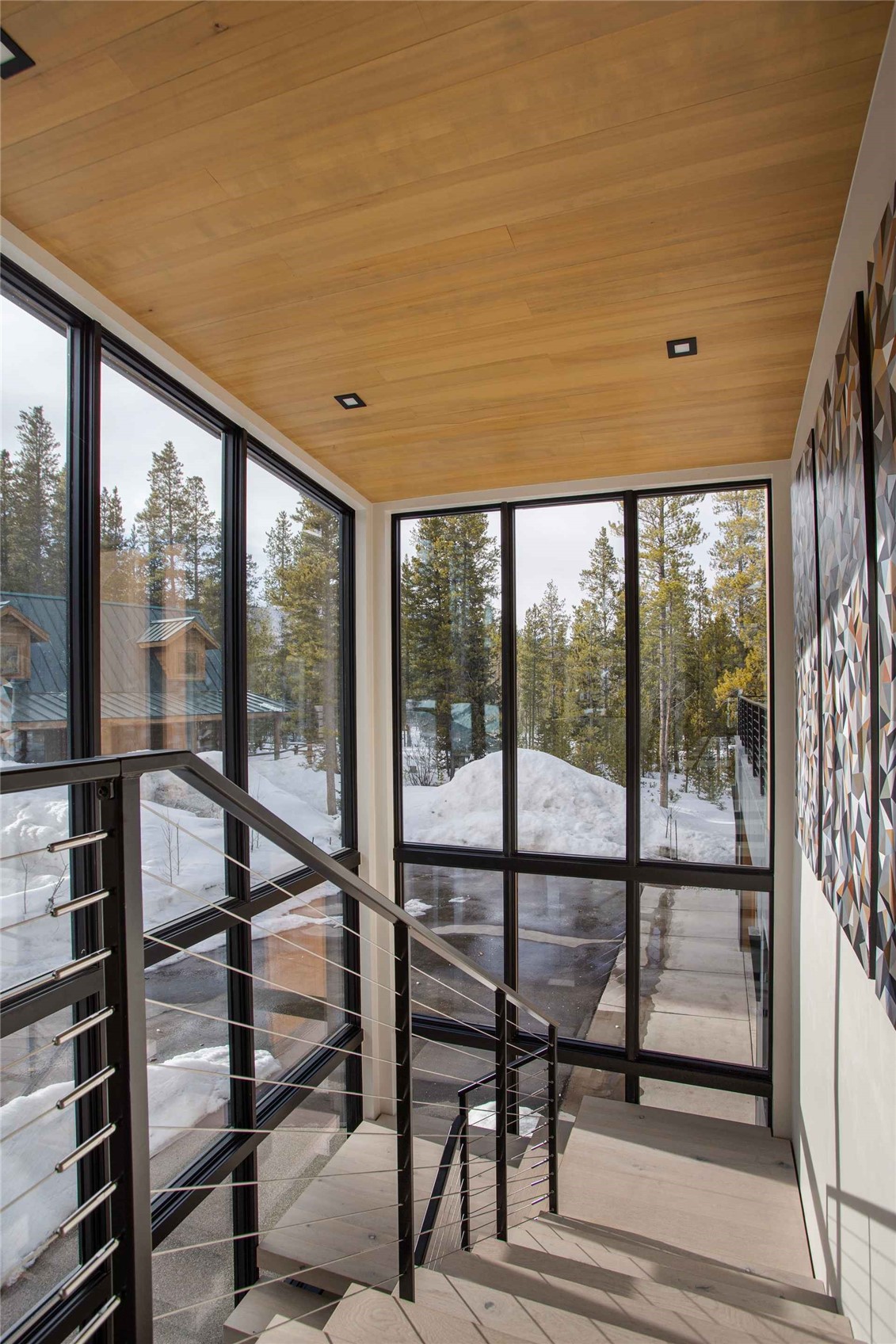 3764 Ski Hill Road Breckenridge, CO 80424 - Photo 29 of 30 Unfurnished sunroom featuring expansive windows and wooden ceiling