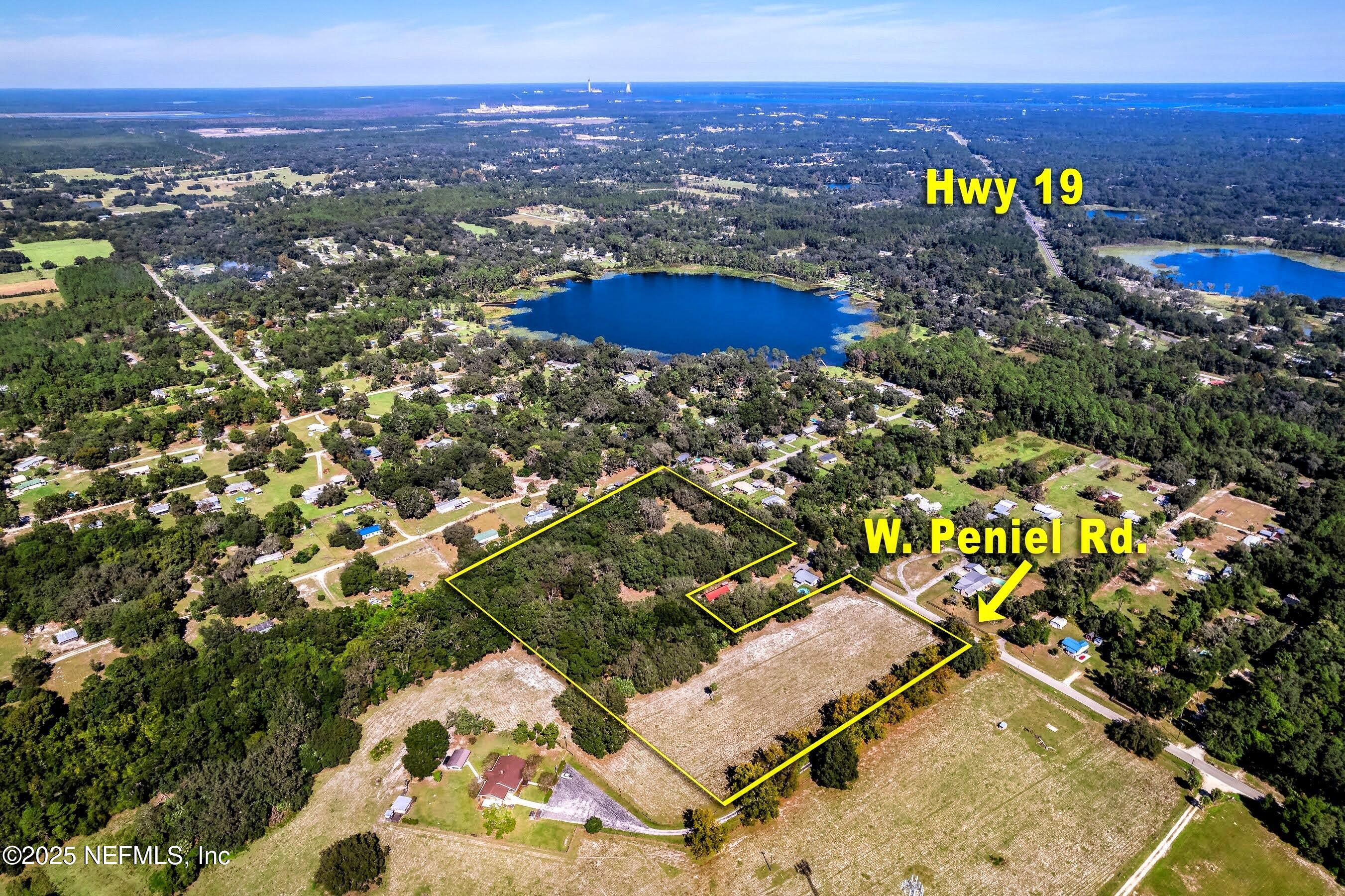 0 West Peniel Road Palatka, FL 32177 - Photo 3 of 40 an aerial view of residential houses with outdoor space