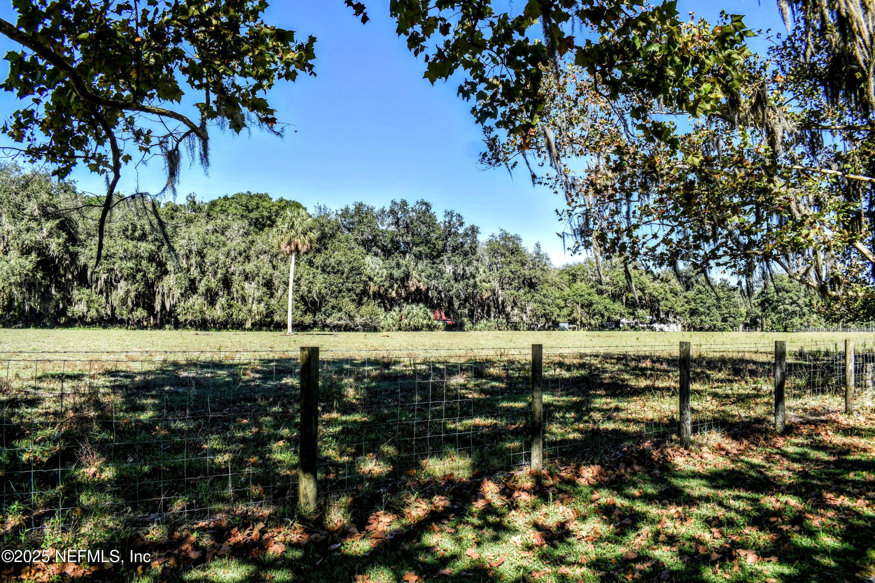 0 West Peniel Road Palatka, FL 32177 - Photo 6 of 40 a view of a yard with wooden fence