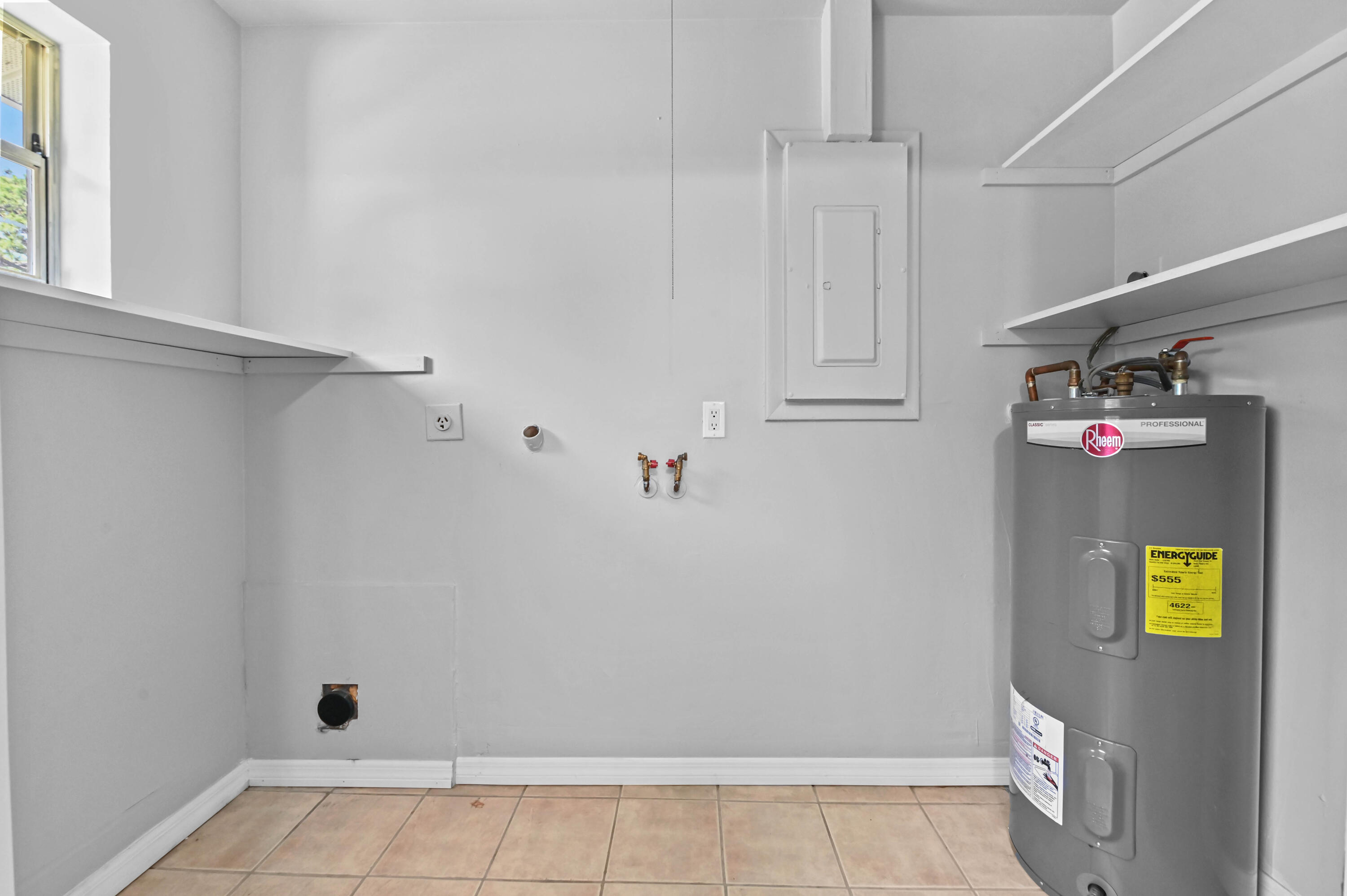 4548 Southeast Salvatori Road Stuart, FL 34997 - Photo 23 of 30 12 laundry room 01