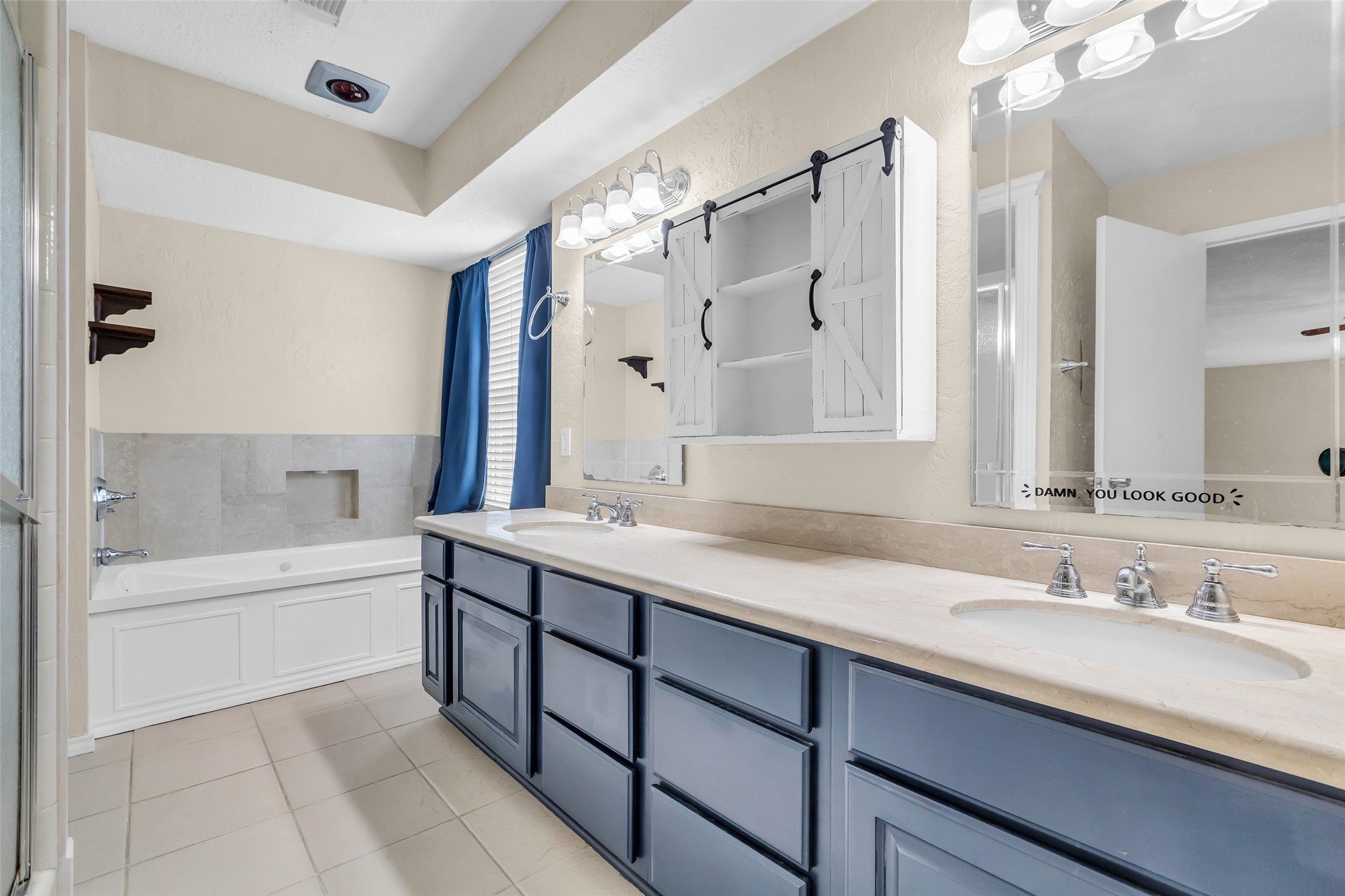 3302 Candlelon Drive Spring, TX 77388 - Photo 16 of 29 a bathroom with a sink double vanity granite tub shower and a mirror