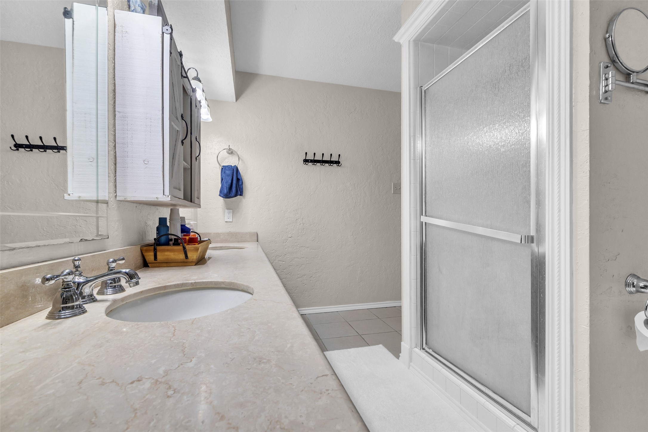 3302 Candlelon Drive Spring, TX 77388 - Photo 17 of 29 a bathroom with a sink and mirror
