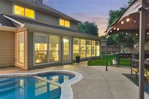 3302 Candlelon Drive Spring, TX 77388 - Photo 2 of 29 a view of a house with a swimming pool and sitting area