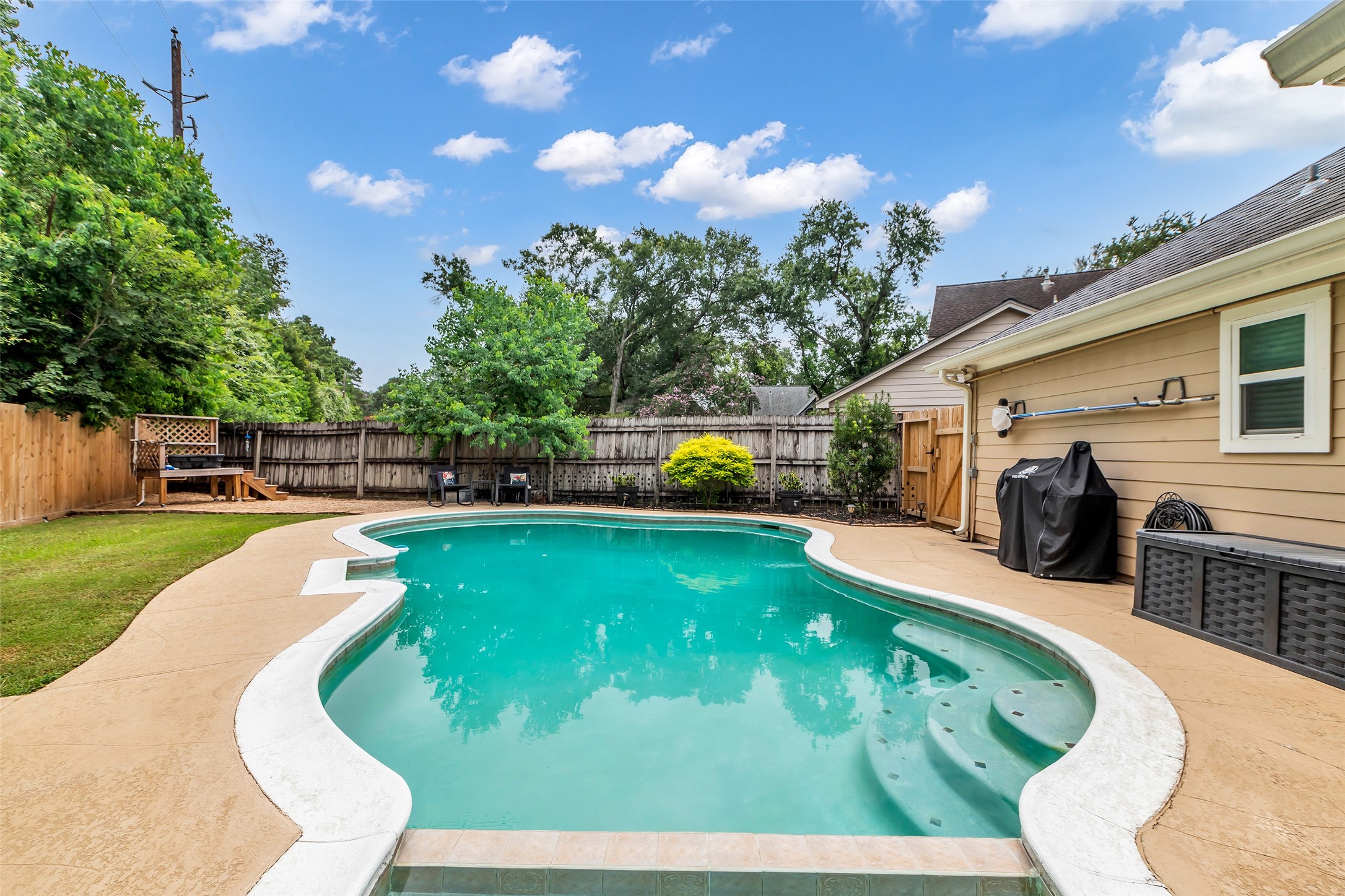 3302 Candlelon Drive Spring, TX 77388 - Photo 23 of 29 a view of a backyard with swimming pool