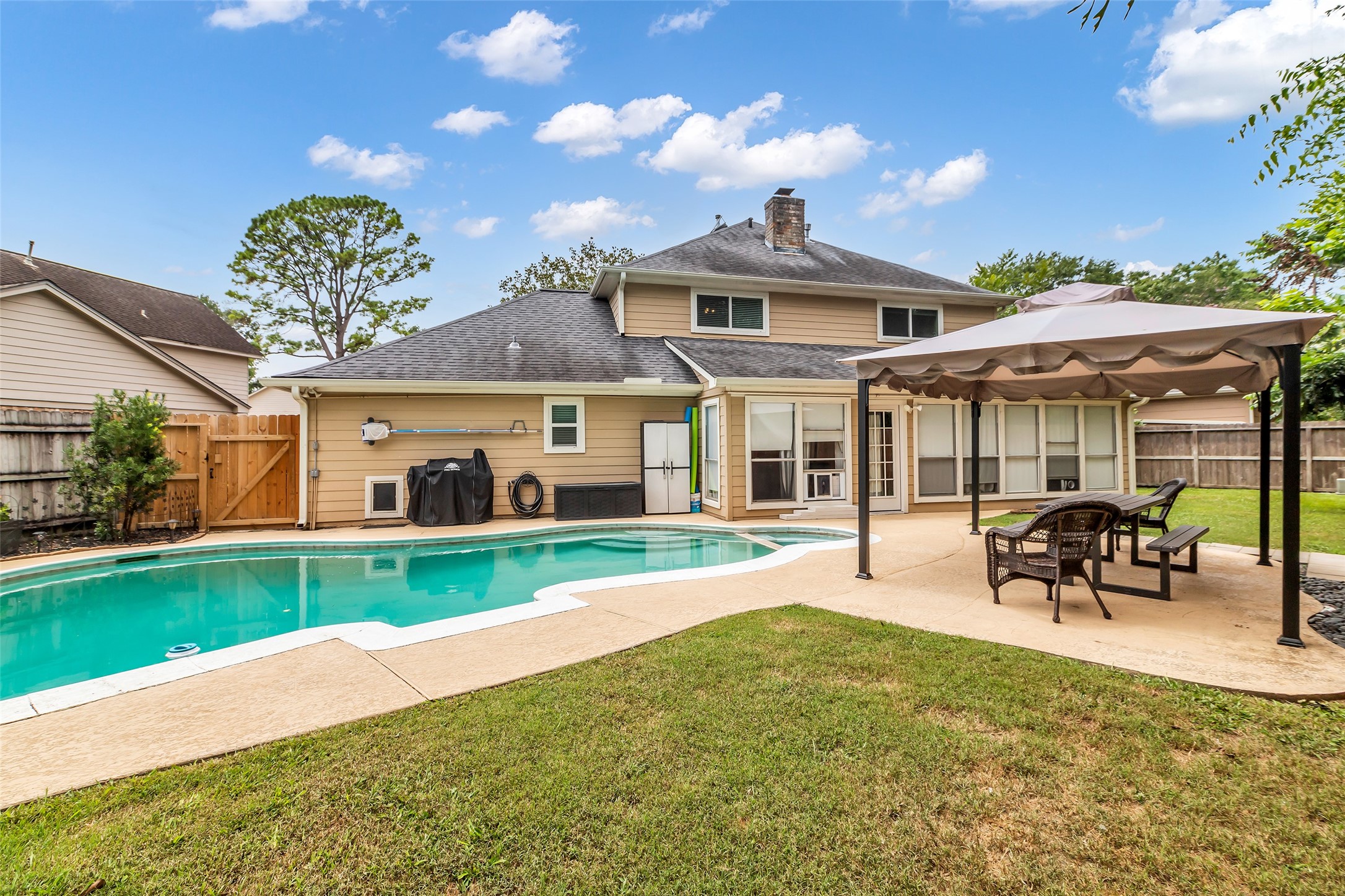 3302 Candlelon Drive Spring, TX 77388 - Photo 24 of 29 a view of a house with a yard patio and a patio