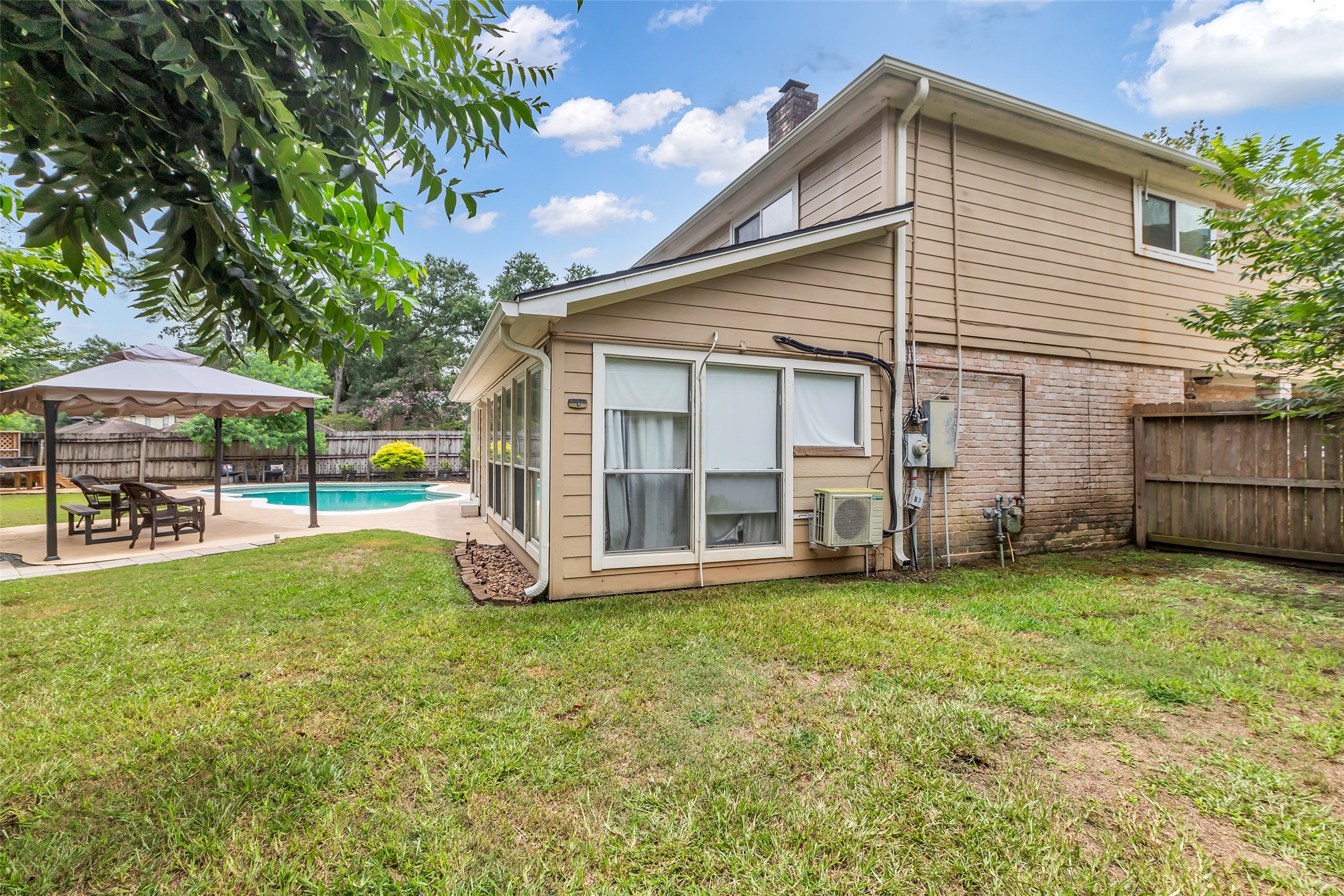 3302 Candlelon Drive Spring, TX 77388 - Photo 27 of 29 a view of a house with backyard porch and garden