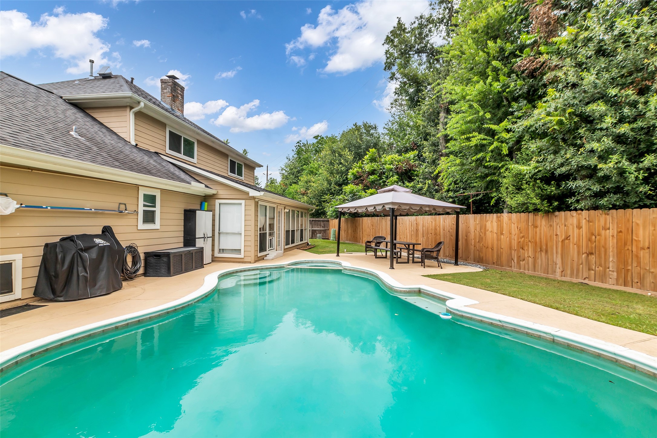 3302 Candlelon Drive Spring, TX 77388 - Photo 29 of 29 a view of a house with swimming pool and sitting area