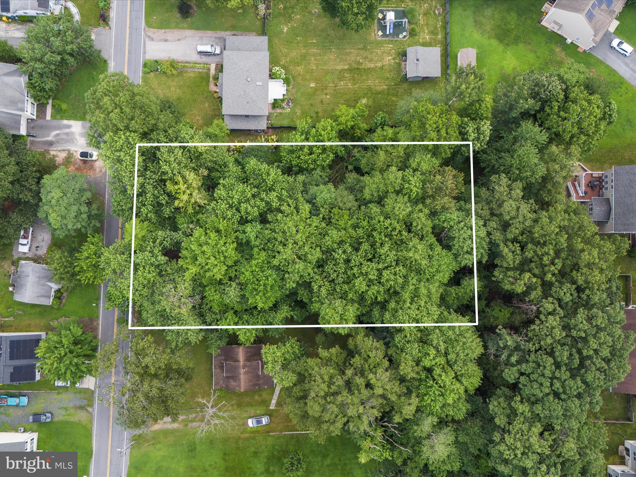 8129 Elizabeth Road Pasadena, MD 21122 - Photo 3 of 13 an aerial view of a houses with yard