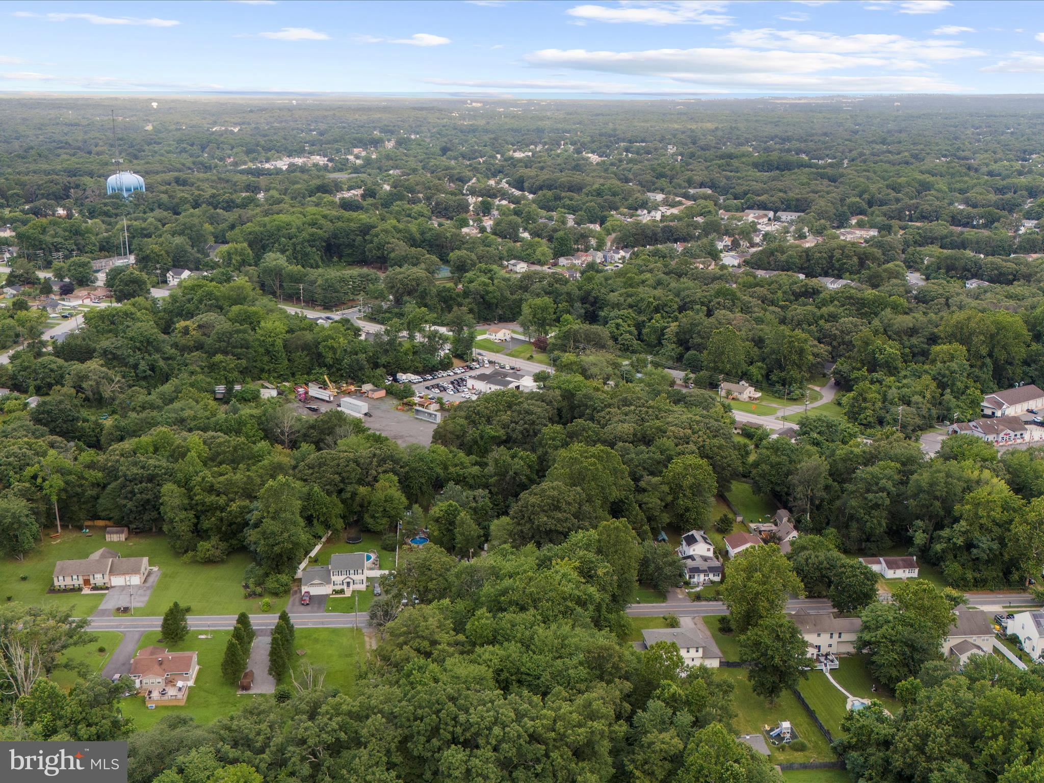8129 Elizabeth Road Pasadena, MD 21122 - Photo 6 of 13 an aerial view of residential houses with city and green space