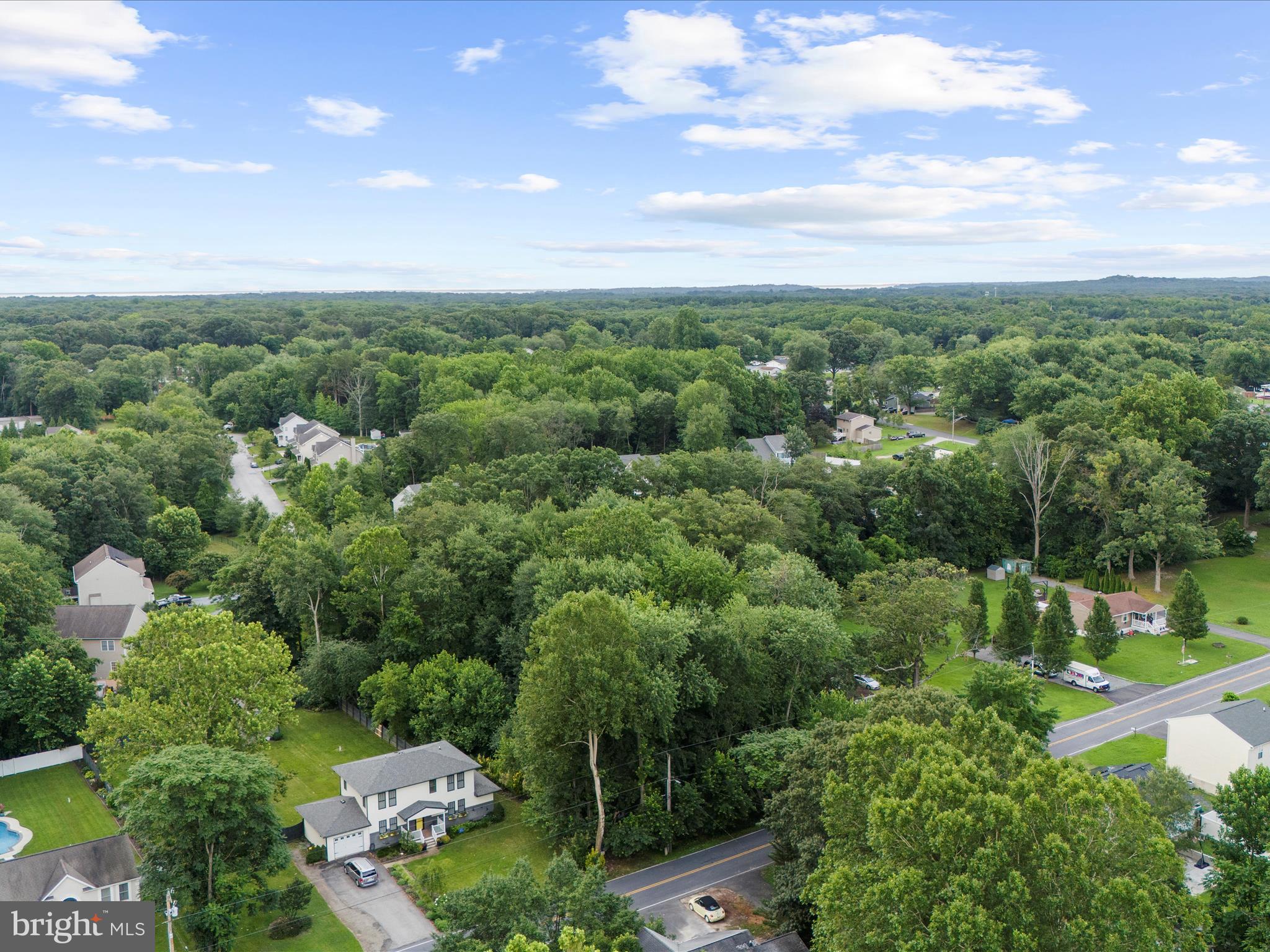 8129 Elizabeth Road Pasadena, MD 21122 - Photo 9 of 13 an aerial view of a houses with city view and lake view