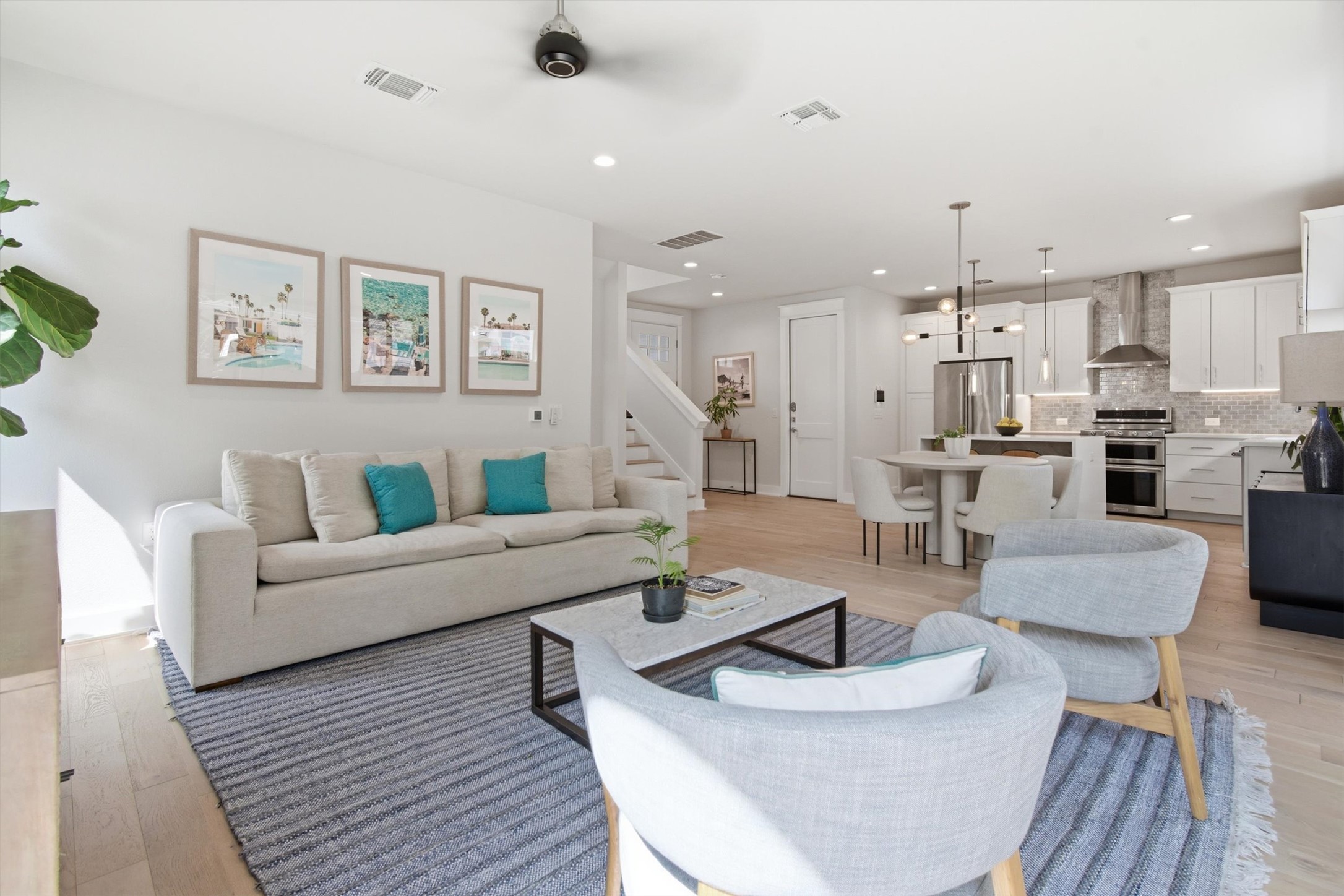 2710 Zaragosa Street, Unit A Austin, TX 78702 - Photo 5 of 29 Bright, flexible great room with a modern ceiling fan and an effortless connection to the dining and kitchen zones.