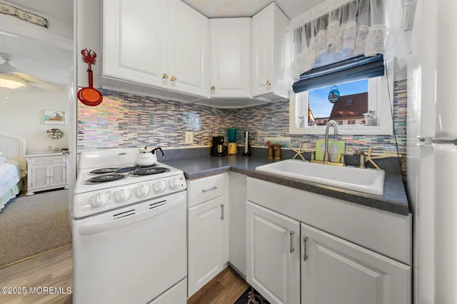 a view of a living room and dining room