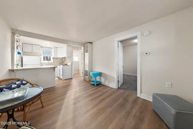 a white refrigerator freezer sitting inside of a kitchen