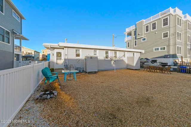 an aerial view of a house with a swimming pool