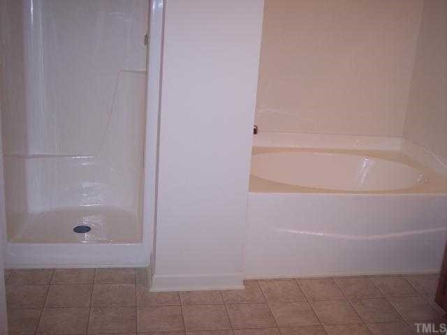 3213 Hornblower Trail Raleigh, NC 27610 - Photo 5 of 9 a bathroom with a shower