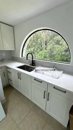 a view of a lush green space