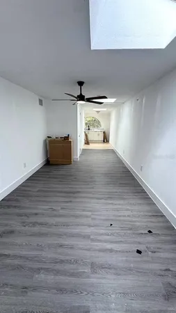 a view of outdoor space with garden and trees