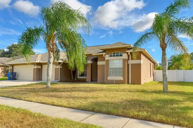 a view of a house with a swimming pool