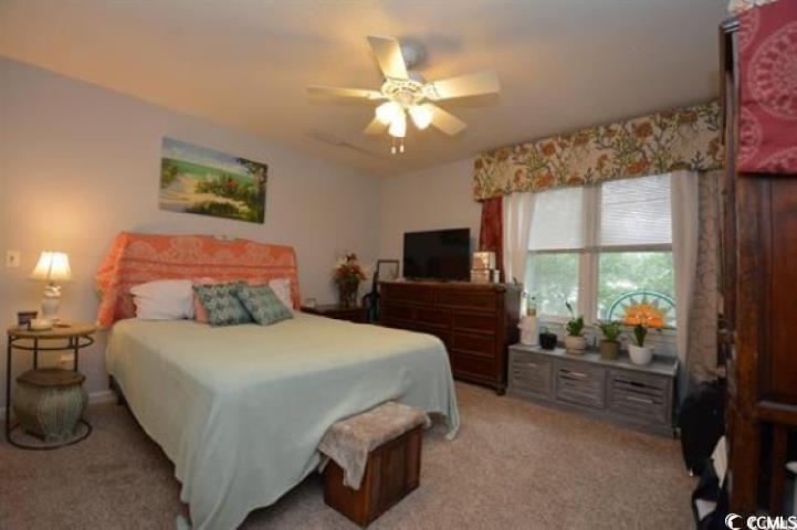 787 Causey Road Murrells Inlet, SC 29576 - Photo 13 of 35 Carpeted bedroom with ceiling fan