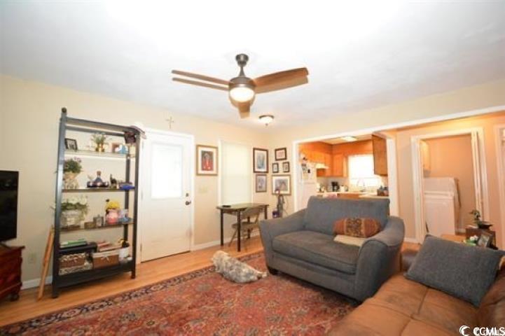787 Causey Road Murrells Inlet, SC 29576 - Photo 15 of 35 Living room featuring ceiling fan, washer / clothe