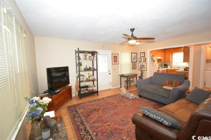 787 Causey Road Murrells Inlet, SC 29576 - Photo 16 of 35 Living room with ceiling fan and light hardwood /