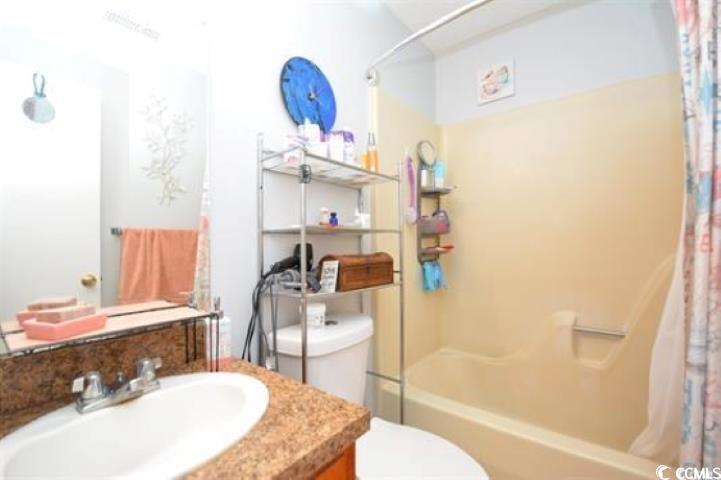 787 Causey Road Murrells Inlet, SC 29576 - Photo 23 of 35 Full bathroom featuring toilet, shower / tub combo
