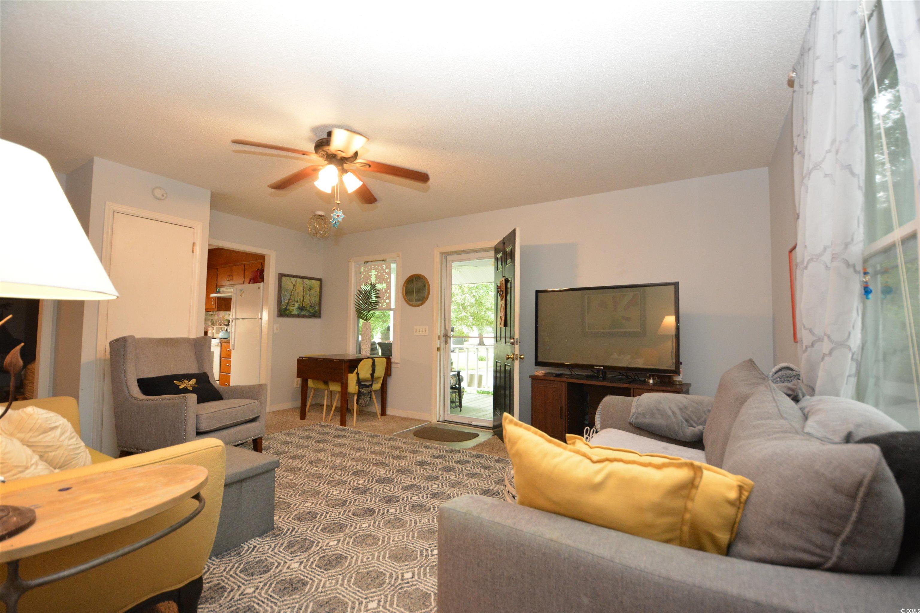 787 Causey Road Murrells Inlet, SC 29576 - Photo 26 of 35 Living room with ceiling fan