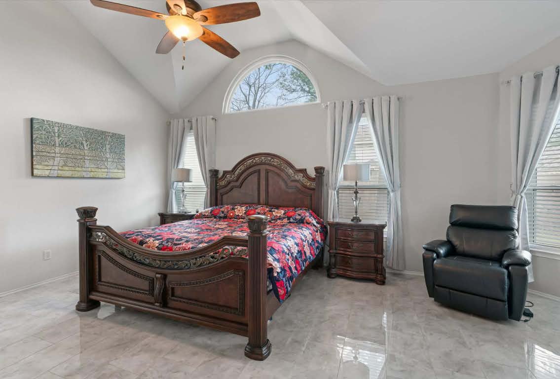 17028 Tortoise Street Round Rock, TX 78664 - Photo 11 of 30 a bedroom with a bed and a window