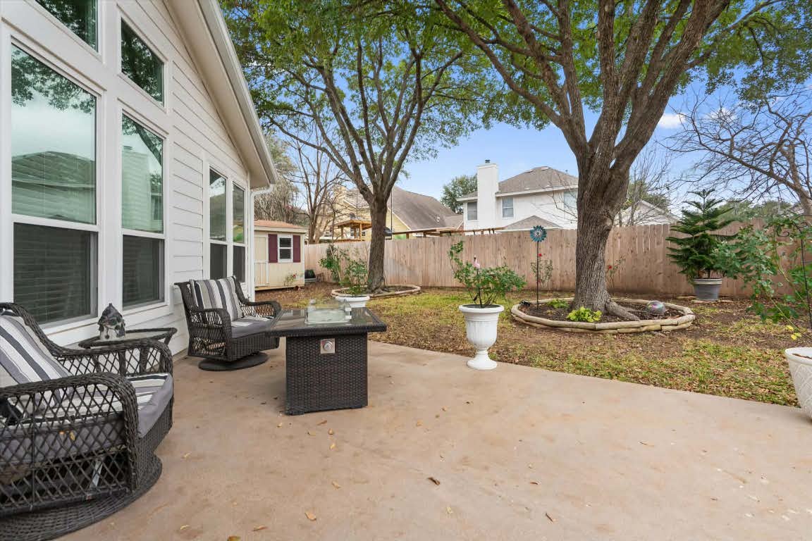 17028 Tortoise Street Round Rock, TX 78664 - Photo 20 of 30 a view of a house with backyard and sitting area