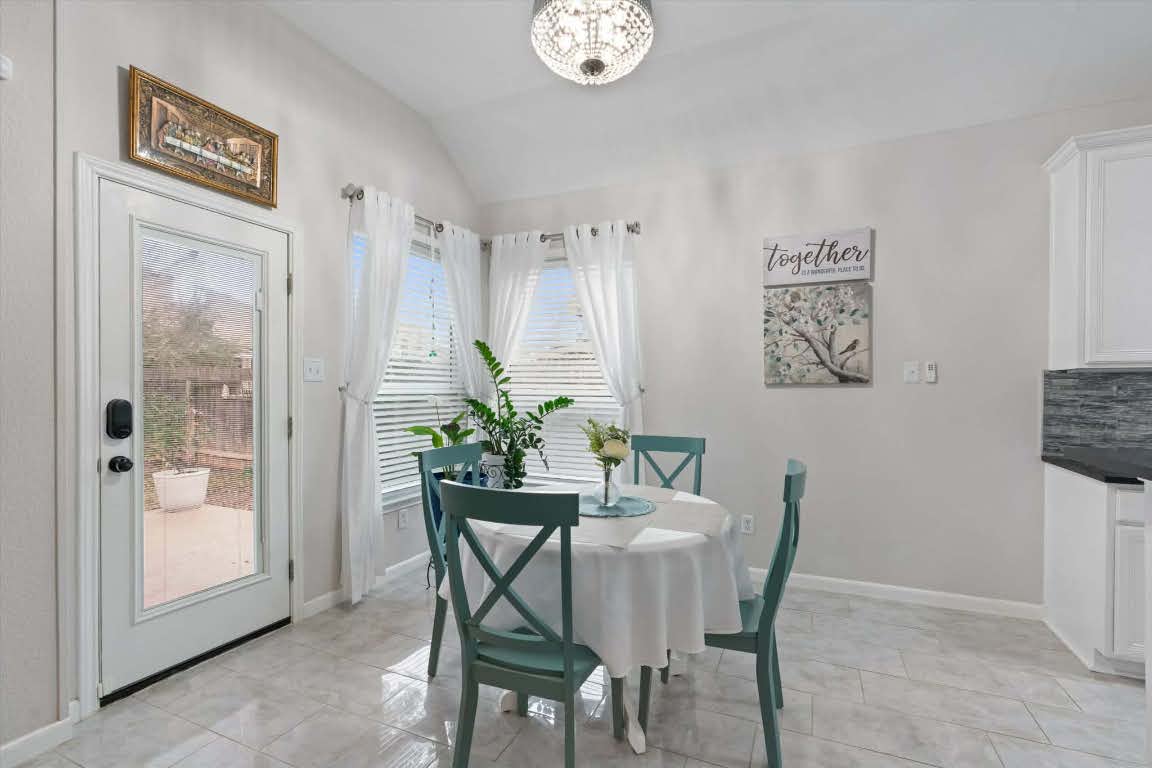 17028 Tortoise Street Round Rock, TX 78664 - Photo 7 of 30 a dining room with furniture and window