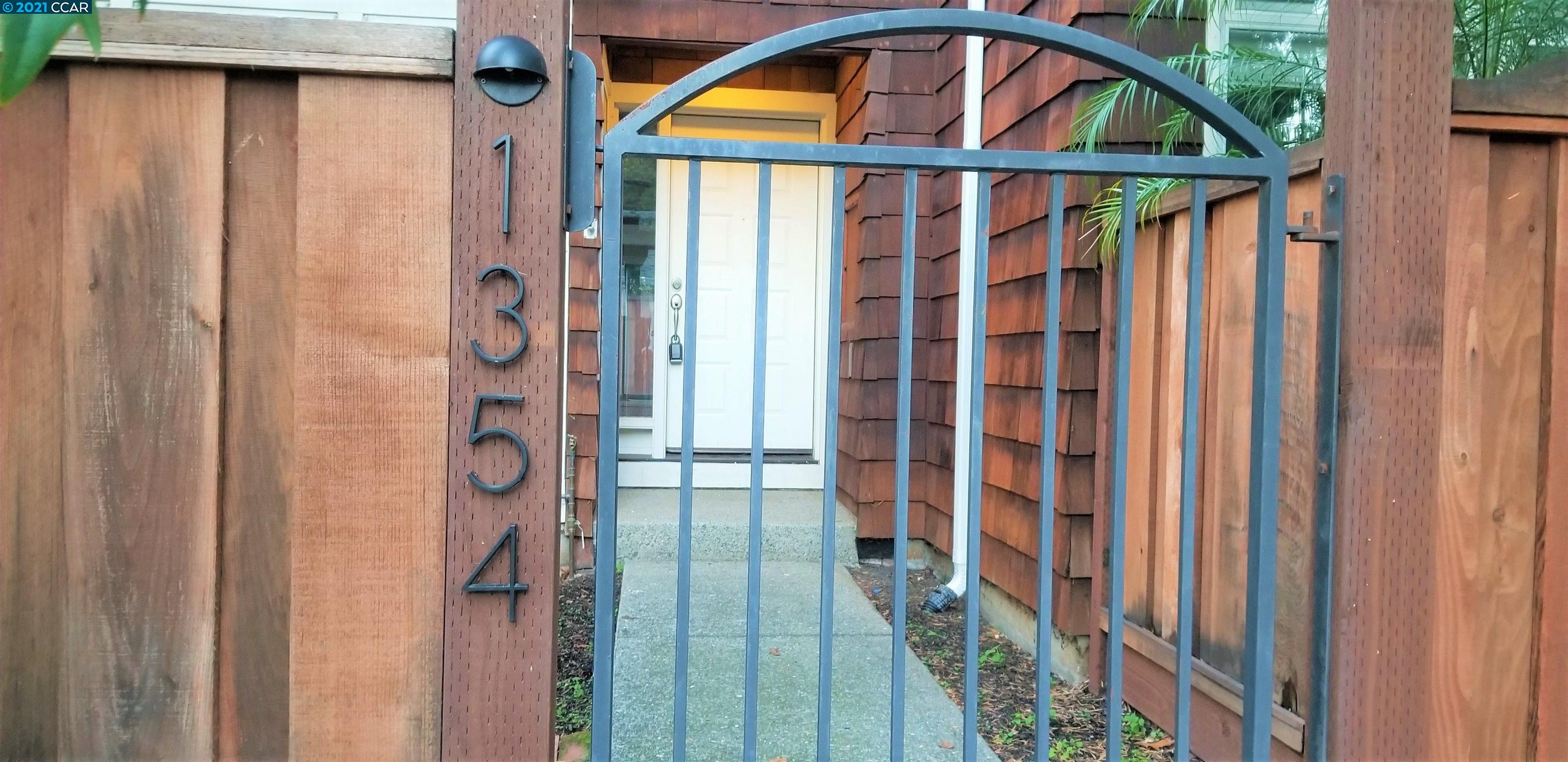 1354 Walden Road Walnut Creek, CA 94597 - Photo 2 of 26 a view of an entryway with wooden floor and door