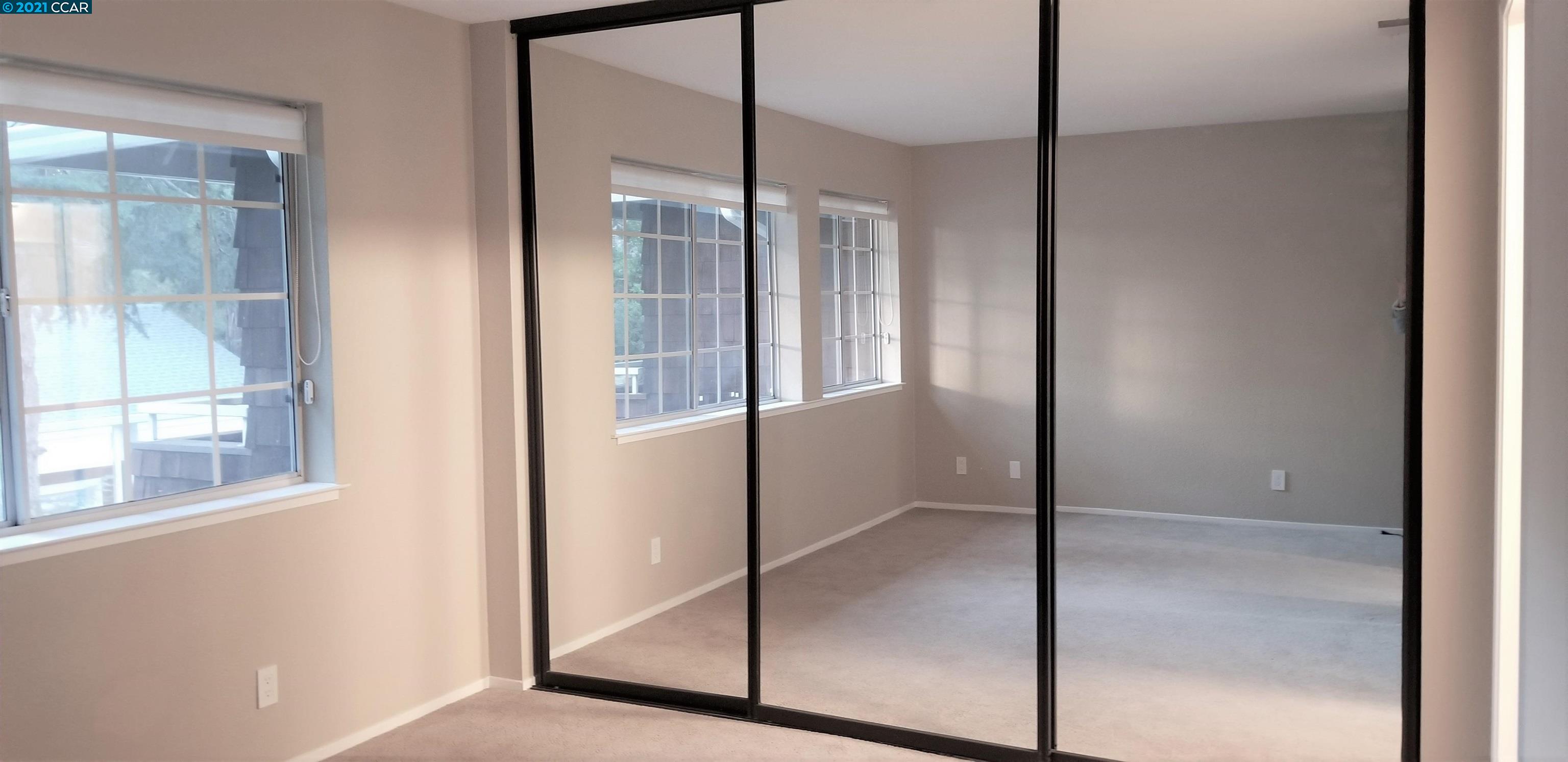 1354 Walden Road Walnut Creek, CA 94597 - Photo 16 of 26 a bathroom with a glass shower door