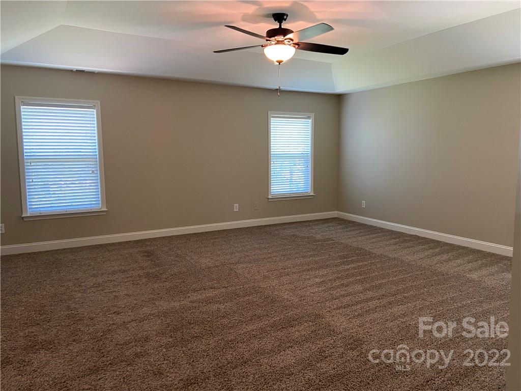 6734 Evanton Loch Road Charlotte, NC 28278 - Photo 26 of 34 a view of an empty room with a window