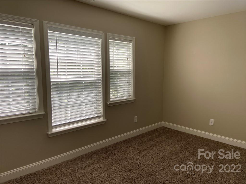 6734 Evanton Loch Road Charlotte, NC 28278 - Photo 34 of 34 a view of a room that has a window in it