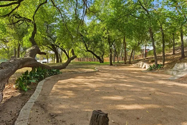 a view of a golf course with a trees