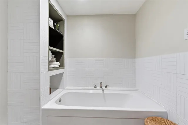 a bathroom with a bathtub